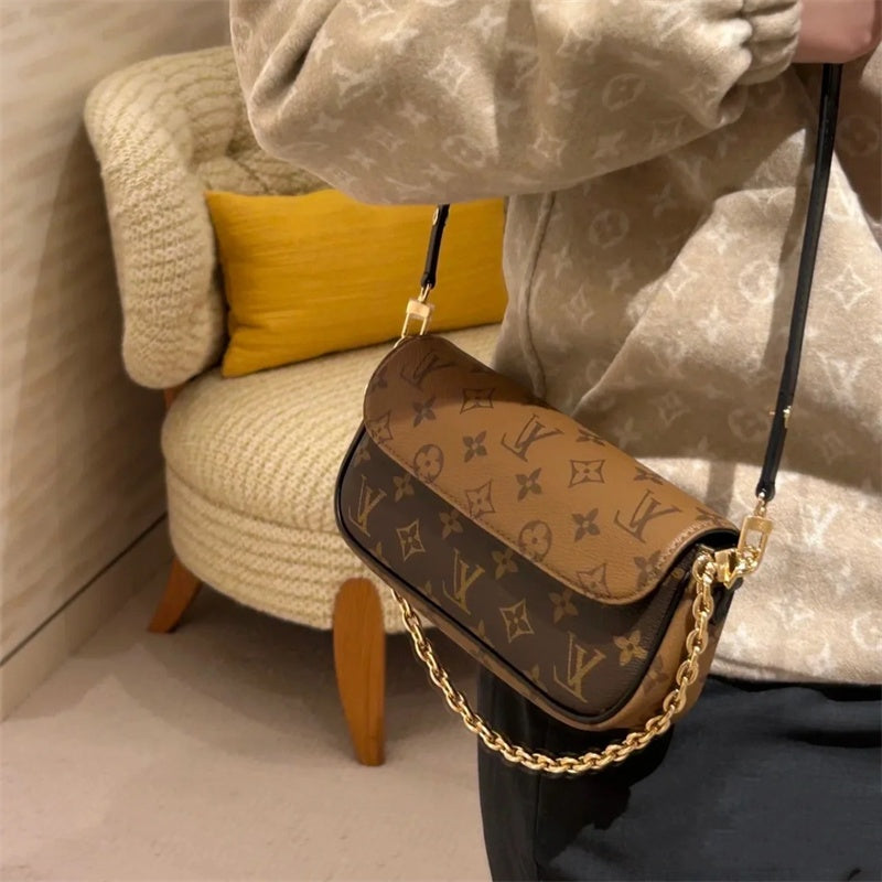 Elegant genuine leather crossbody bag With chain